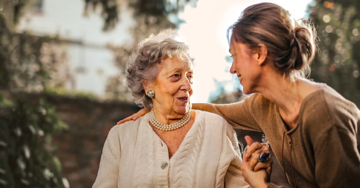 Elderly woman and adult daughter sitting together: how to convince elderly parents to move in with you